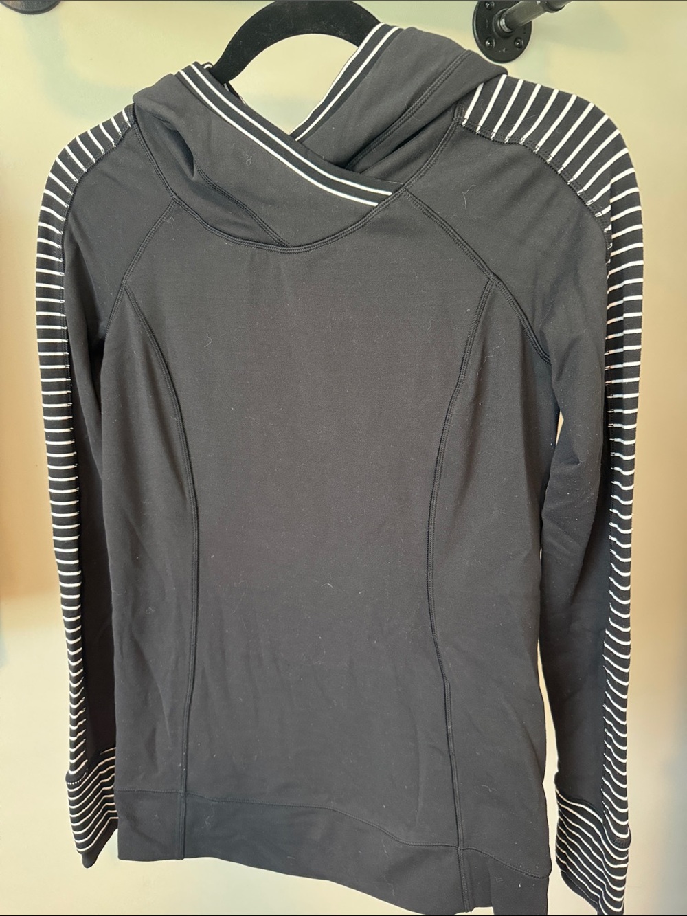 LuluLemon Black Hooded Pullover with Striped Accents.